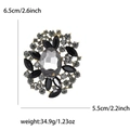 Broche redondo vintage con cristal gris y piedras negras, tamaño de 6,5 cm largo - Negro