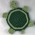Handmade crochet turtle coaster in dark green yarn for desk heat insulation - Green