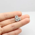 Silver mouse silhouette pendant with sparkling cubic zirconia on a human fingertip - 10MM Chrome Rhinestone - Mickey Silhouette
