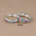 Macro shot of 9mm S925 silver hoop earrings with multi-colored zirconia stones - 9mm / Silver