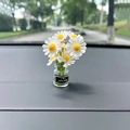 Mini glass vase with white and yellow daisies and Good Mood label on a dashboard - White Daisy Vase Only