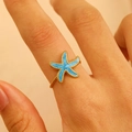 Anello stella marina in acciaio inossidabile dorato con smalto blu stile oceano - Stella Marina Blu (4723)