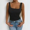 Minimalist black square neck slim fit tank top for women styled with denim jeans - Black