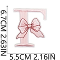 Detail of pink bow letter F embroidered patch showing 6.7cm height and 5.5cm width - Bow Alphabet Letter F