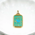 Macro view of gold-plated tarot pendant featuring teal enamel with blue heart and stars - Heart Planet - Cyan (Pendant Only)