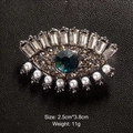 Evil eye pearl brooch with dark blue crystal and vintage gunmetal finish detail - Evil Eye (XD8330-1)