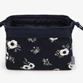 Dark blue floral fabric organizer pouch with a secure top zipper for travel cosmetics - Black Floral