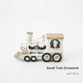 White glittery Christmas train ornament with green wreath and gold bow, size 4x12cm - Christmas Train (1 Piece)