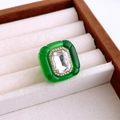 Macro detail of vintage emerald green resin ring with crystal inlay in jewelry box - Green & Transparent