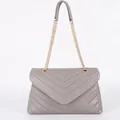 Elegant grey quilted shoulder bag with V-pattern stitching and golden chain strap - Gray