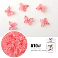 Macro detail of 3D resin butterfly nail art charms in orange-pink gradient finish - Simulated Butterfly A10# (Pink & Purple Gradient)