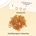 Detailed view of gold jump rings for DIY jewelry, 8x6mm size, 100 pieces per pack - 8*5mm Jump Rings / KC Gold