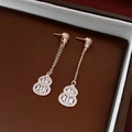 Elegant gold-plated gourd earrings with clear cubic zirconia on a rustic wooden tray - 14K Gold Plated Zirconia Gourd Tassel Earrings with Silver Earring Post