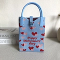 Blue knitted mini tote bag with pink heart patterns and Happy Valentine's Day text - Blue Background Double Heart Letters