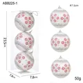 Trois boules de Noël en mousse blanche avec flocons rouges et rayures argentées, 7,5cm - Boule en Mousse à Fleurs/3 Pièces