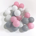 Detail of pink, white and gray cotton ball fairy lights with woven texture surface - White Pink Gray
