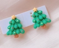 Macro detail of cute Christmas tree clip-on earrings with colorful resin star ornaments - 11# Christmas Tree / Clip-on Earrings Pair