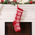 Red knitted Christmas stocking with white snowflake patterns hanging on fireplace - Style B Red Snowflake