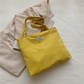Fashionable yellow corduroy tote bag with dual shoulder straps and brand label - Yellow