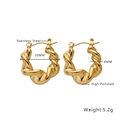 Detail showing 20mm stainless steel golden hoop earrings with twisted texture design - E189 Spiral Twisted Hoop / Gold