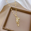Detailed view of crystal bear pendant with star charm and exact product dimensions - B135 Gold Style (B135)