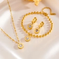 Macro detail of gold stainless steel jewelry set with Roman numeral ring and zircon inlay - White Rhinestone Roman Jewelry Set
