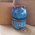 Close-up of tulip-shaped ceramic aroma burner with deep blue reactive glaze and leaf relief - Tulip Burner (Bluish)