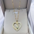 Detail of 18K gold heart necklace with snake motif and green zircon eyes - 0615-Gold Heart Snake Head Green Eye