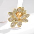 Macro shot of gold lotus brooch with sparkling crystals and central gold pearl - Peony Gold Bead Style (X0263)