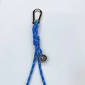 Blue braided lanyard keychain with white dots, silver carabiner and polished metal bell - Blue