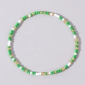 Minimalist beaded bracelet with alternating green, white and golden seed beads - Green White Gold
