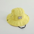 Detail of yellow quick-dry sun hat showing reinforced brim stitching and bear patch - Yellow / 52cm