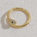 Golden snake ring with white zircon pave setting and green gemstone eyes in gold finish - Snake Zirconia / Gold