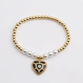 Pulsera de cuentas doradas con colgante de corazón de ojo turco y perlas blancas finas - Corazón Ojo del Mal
