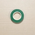 Single roll of dark green florist tape for DIY craft projects on a textured background - 2 Rolls / Dark Green Tape