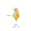 Golden unicorn brooch with white zircon stones and yellow oval crystal center - B756 Golden/Seahorse