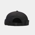 Close-up of a black waterproof miki hat with adjustable nylon strap and plastic buckle - Adjustable / Black