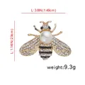 Elegant gold bee brooch with white crystals and large pearl detail for suits - Bee B07025