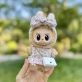 Labubu plush doll wearing a stylish tweed jacket outfit and a small quilted crossbody bag - Pink Iridescent Fragrance Keychain + Small C-bag / First And Second Generation Keychains Are Compatible With La Cloth Dolls. Dolls Not Included.