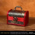 Vintage red wooden jewelry box with cherry blossom pattern and antique bronze handle - Cherry Blossom Handle - Unlocked