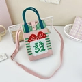 Detail of pink knitted crossbody bag featuring green Mahjong character embroidery - 9-Pink and Green Striped-Fa