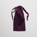 Elegant purple silk drawstring storage pouch with smooth satin texture and fold detail - Dark Purple