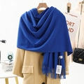 Navy blue knitted long scarf with tassel detail draped on a stylish khaki wool coat - Bulky Yarn Style / 200x70cm / Sapphire Blue