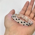 Multi-layer coil bracelet with silver metal, white rhinestones, and black beads - Black & White Zirconia Coil Bracelet (C1086)