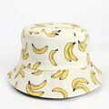 Detail of banana print on cream canvas reversible bucket hat with neat stitching - M (56-58cm) / Beige