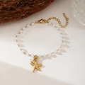 Bracelet élégant en perles blanches avec pendentif étoile de mer et chaîne dorée réglable - Bracelet Perle Artificielle Étoile de Mer (E225) / Or