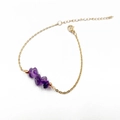 Detail view of purple raw amethyst stone bracelet with golden chain and adjustable clasp - Purple Crystal