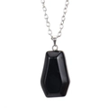 Detailed view of coffin shaped black obsidian pendant with faceted geometric edges and chain - Obsidian