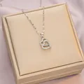 Elegant silver titanium steel interlocking heart necklace with zircon inlay for women - 6049 Double Heart Zircon / Silver