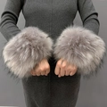 Detail of soft fluffy grey faux fur wrist cuffs shown on model's arms in a pair - Grey Black Jacquard